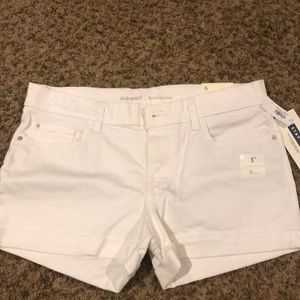 White boyfriend shorts.